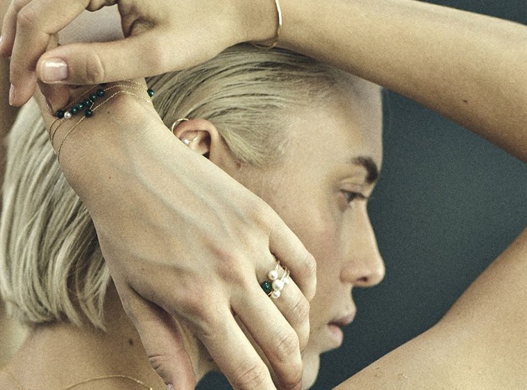 women with ring in pearls